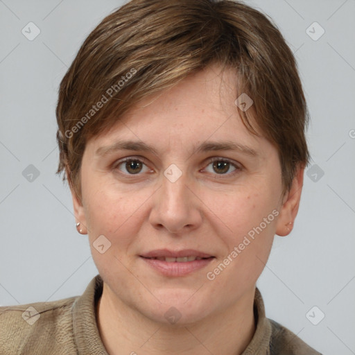 Joyful white young-adult female with short  brown hair and grey eyes