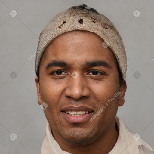 Joyful white adult male with short  black hair and brown eyes