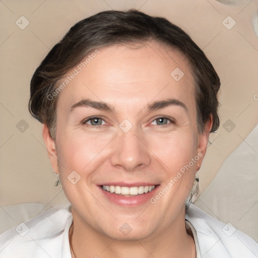 Joyful white adult female with short  brown hair and brown eyes