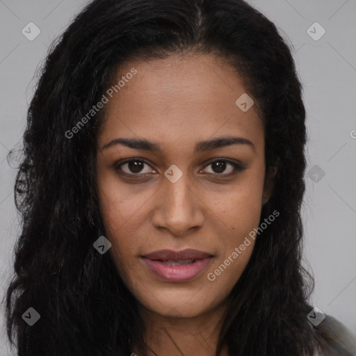 Joyful black young-adult female with long  brown hair and brown eyes