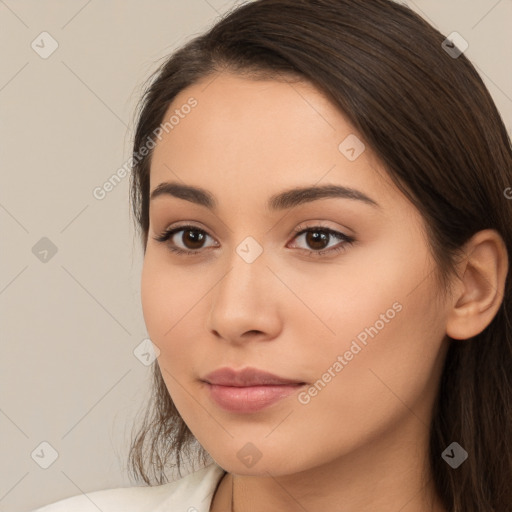 Neutral white young-adult female with long  brown hair and brown eyes