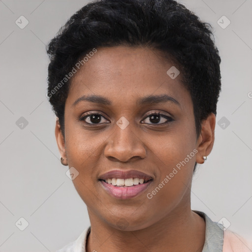 Joyful black young-adult female with short  black hair and brown eyes