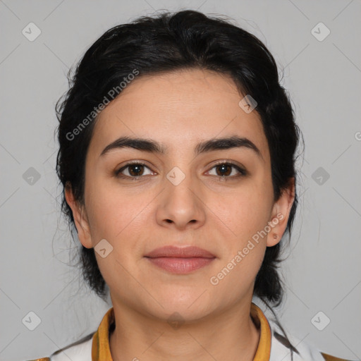 Joyful latino young-adult female with medium  brown hair and brown eyes