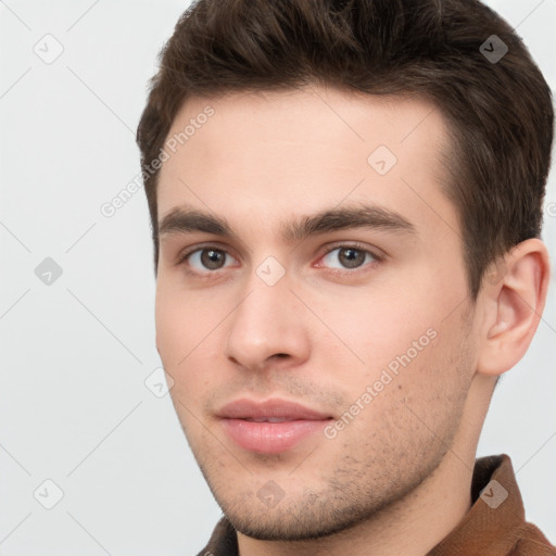 Neutral white young-adult male with short  brown hair and brown eyes