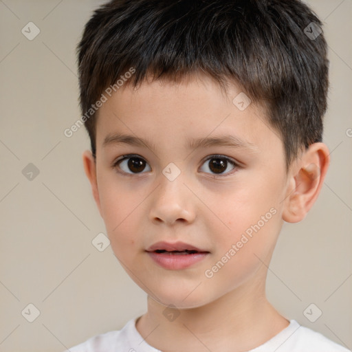 Joyful white child male with short  brown hair and brown eyes