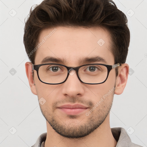 Neutral white young-adult male with short  brown hair and grey eyes