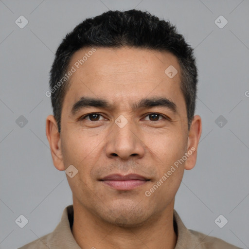 Joyful white young-adult male with short  black hair and brown eyes