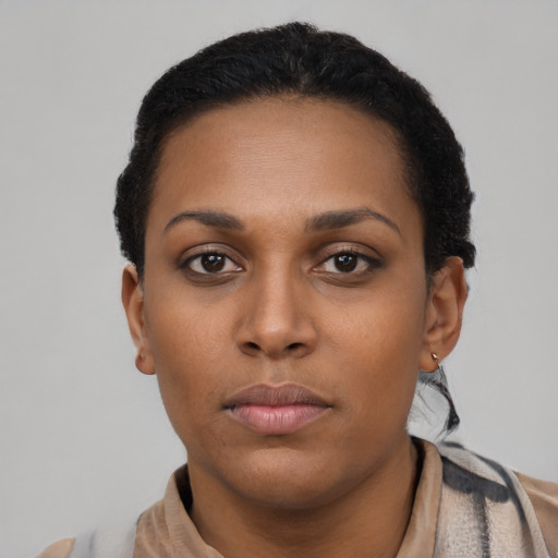 Neutral latino young-adult female with short  black hair and brown eyes