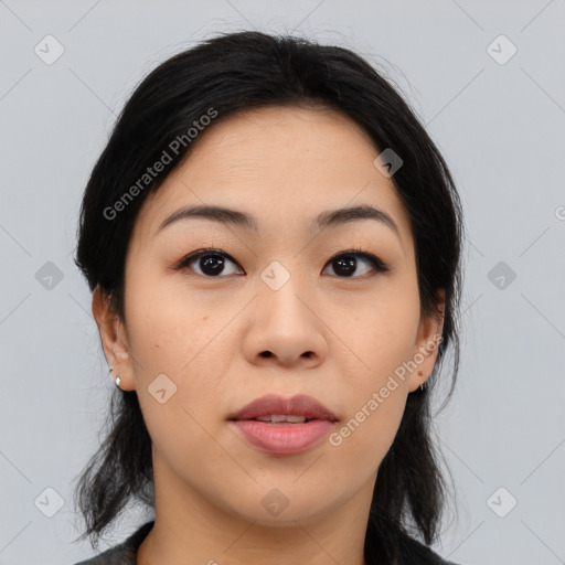 Joyful asian young-adult female with medium  black hair and brown eyes