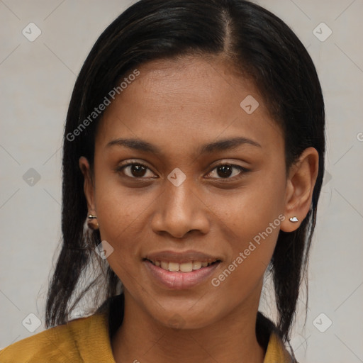 Joyful black young-adult female with medium  brown hair and brown eyes