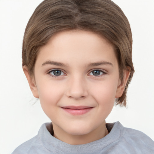 Joyful white child female with short  brown hair and brown eyes