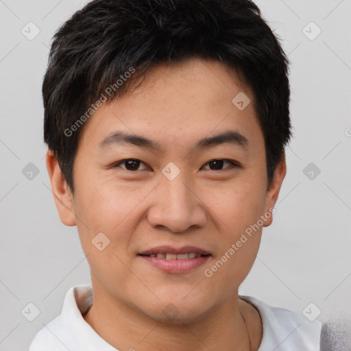 Joyful asian young-adult male with short  brown hair and brown eyes