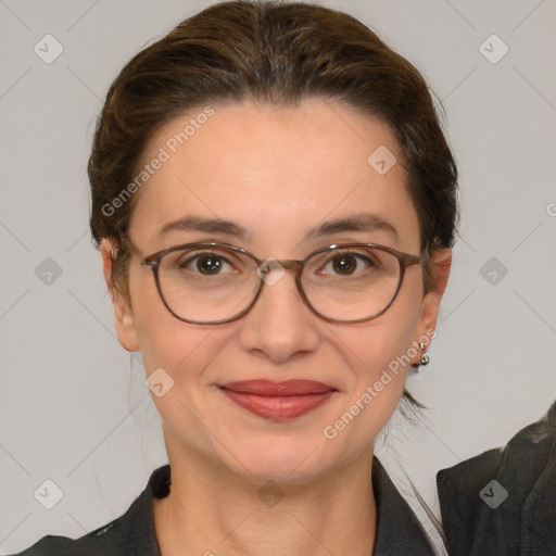 Joyful white adult female with medium  brown hair and brown eyes