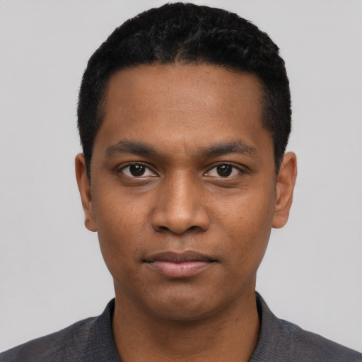 Neutral black young-adult male with short  black hair and brown eyes