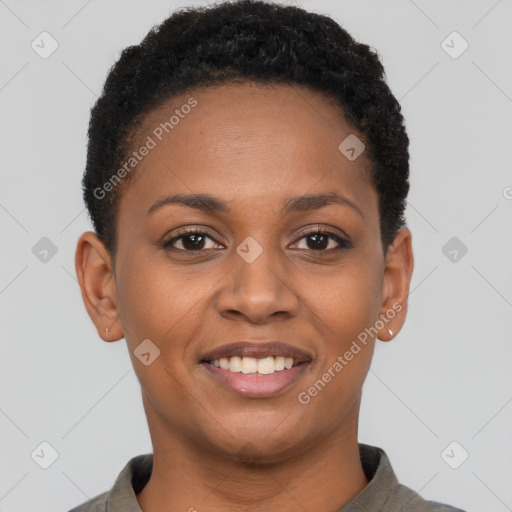 Joyful black young-adult female with short  brown hair and brown eyes