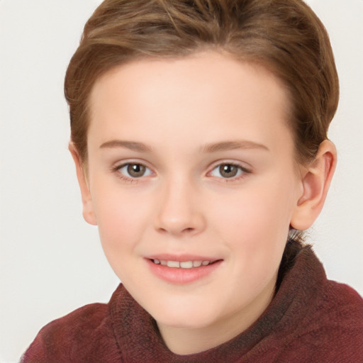 Joyful white child female with short  brown hair and brown eyes