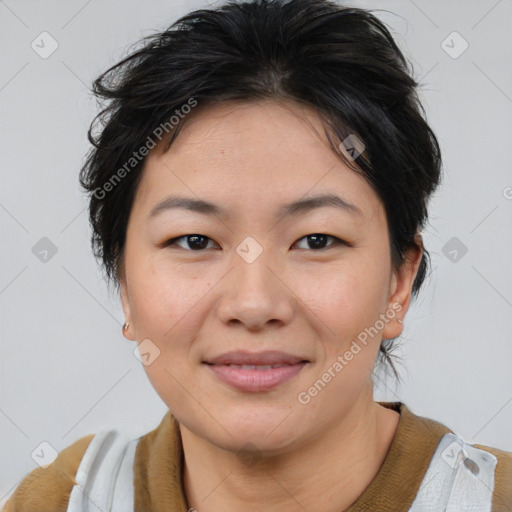 Joyful asian young-adult female with short  brown hair and brown eyes