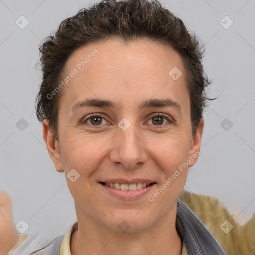 Joyful white adult female with short  brown hair and brown eyes