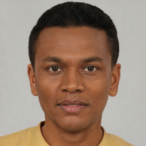 Neutral black young-adult male with short  black hair and brown eyes
