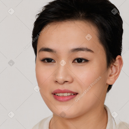 Joyful asian young-adult female with short  brown hair and brown eyes