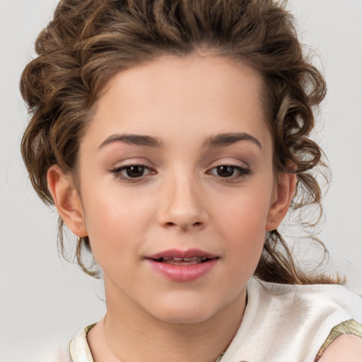 Joyful white child female with medium  brown hair and brown eyes