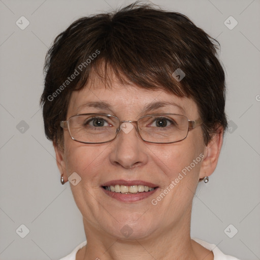 Joyful white adult female with short  brown hair and brown eyes