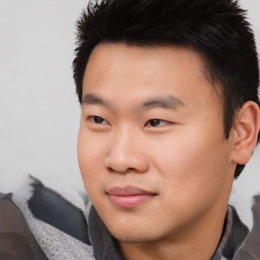 Neutral asian young-adult male with short  black hair and brown eyes