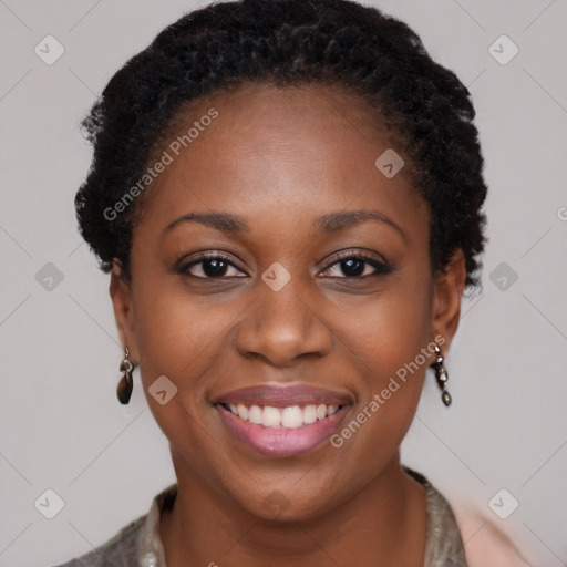 Joyful black young-adult female with short  brown hair and brown eyes