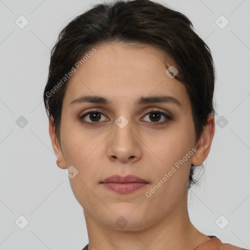 Neutral white young-adult female with short  brown hair and brown eyes