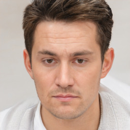 Neutral white adult male with short  brown hair and brown eyes