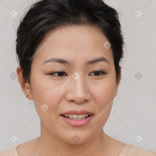 Joyful asian young-adult female with short  brown hair and brown eyes