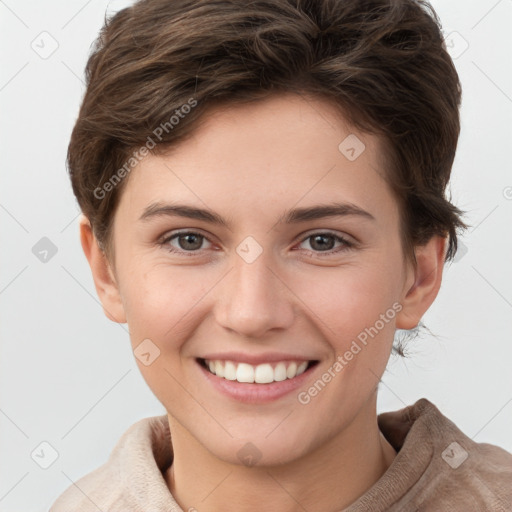 Joyful white young-adult female with short  brown hair and grey eyes