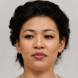 Neutral asian young-adult female with medium  black hair and brown eyes