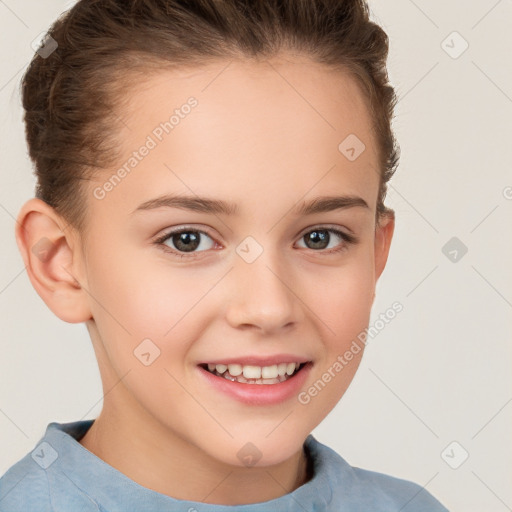 Joyful white child female with short  brown hair and brown eyes