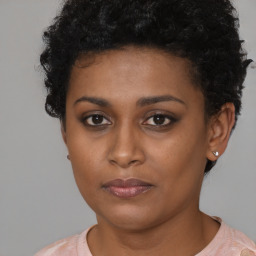 Neutral black young-adult female with short  brown hair and brown eyes