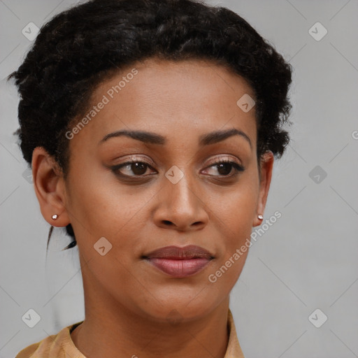 Joyful black young-adult female with short  brown hair and brown eyes