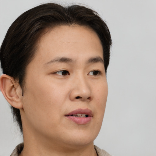 Neutral asian young-adult female with short  brown hair and brown eyes