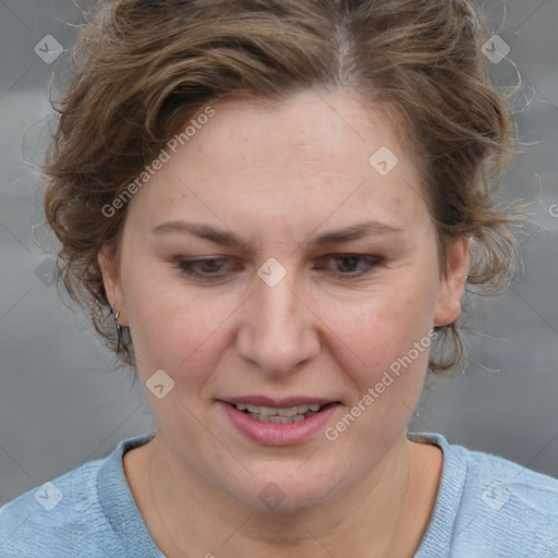 Joyful white adult female with medium  brown hair and blue eyes