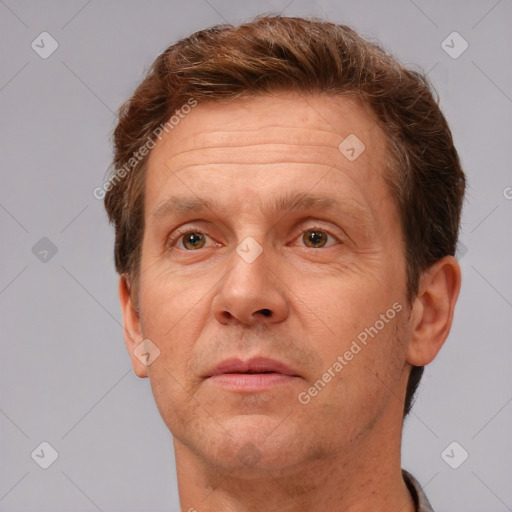 Neutral white adult male with short  brown hair and brown eyes