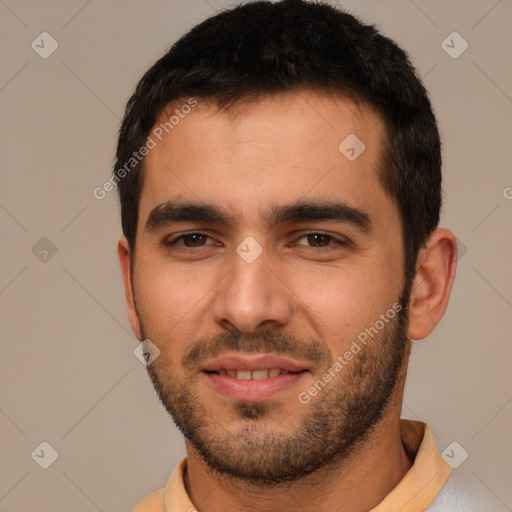 Joyful white young-adult male with short  black hair and brown eyes