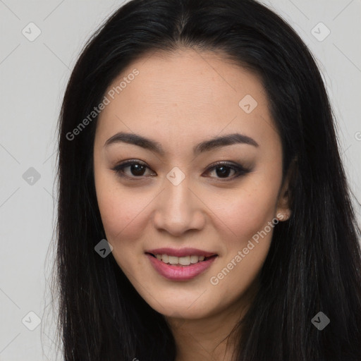 Joyful asian young-adult female with long  brown hair and brown eyes