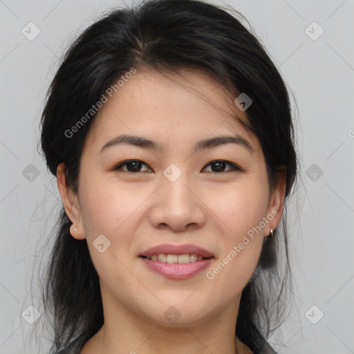 Joyful asian young-adult female with long  brown hair and brown eyes