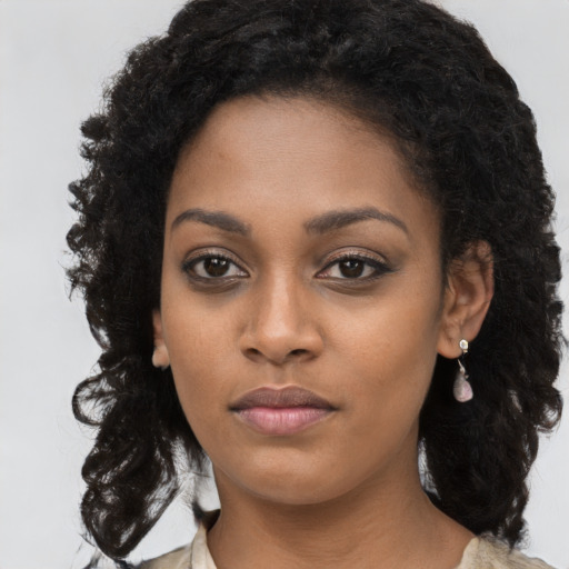 Neutral black young-adult female with long  black hair and brown eyes