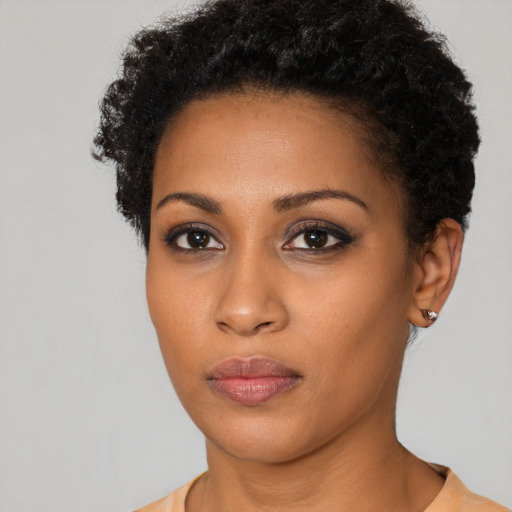 Neutral black young-adult female with short  brown hair and brown eyes