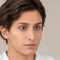 Neutral white young-adult female with short  brown hair and brown eyes