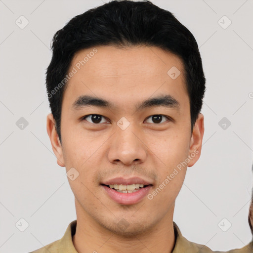 Joyful asian young-adult male with short  black hair and brown eyes