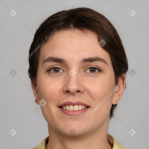 Joyful white young-adult female with medium  brown hair and brown eyes