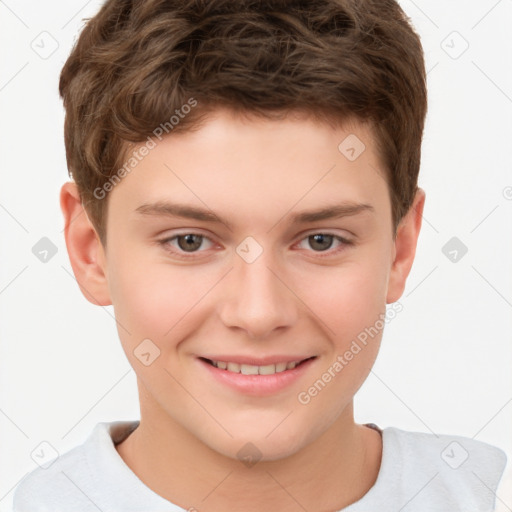 Joyful white child male with short  brown hair and brown eyes