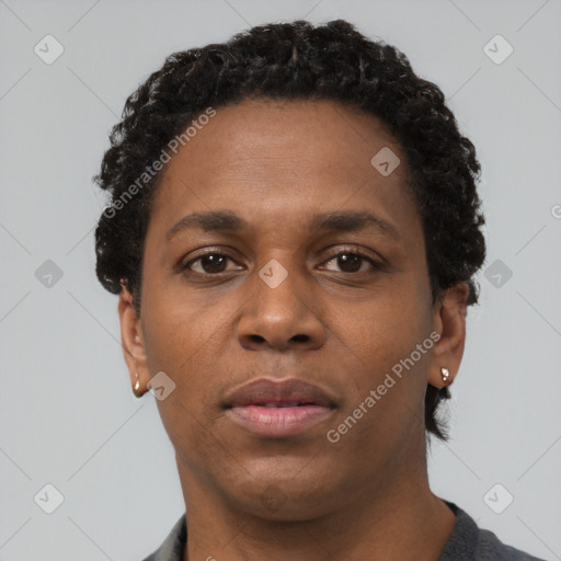 Neutral black adult female with short  black hair and brown eyes