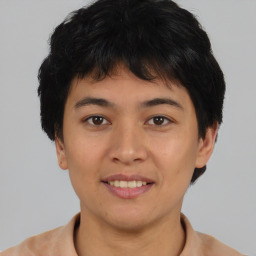 Joyful asian young-adult female with short  brown hair and brown eyes